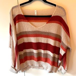 Beautiful multi colored sweater. Great condition. Oversized loose fit.